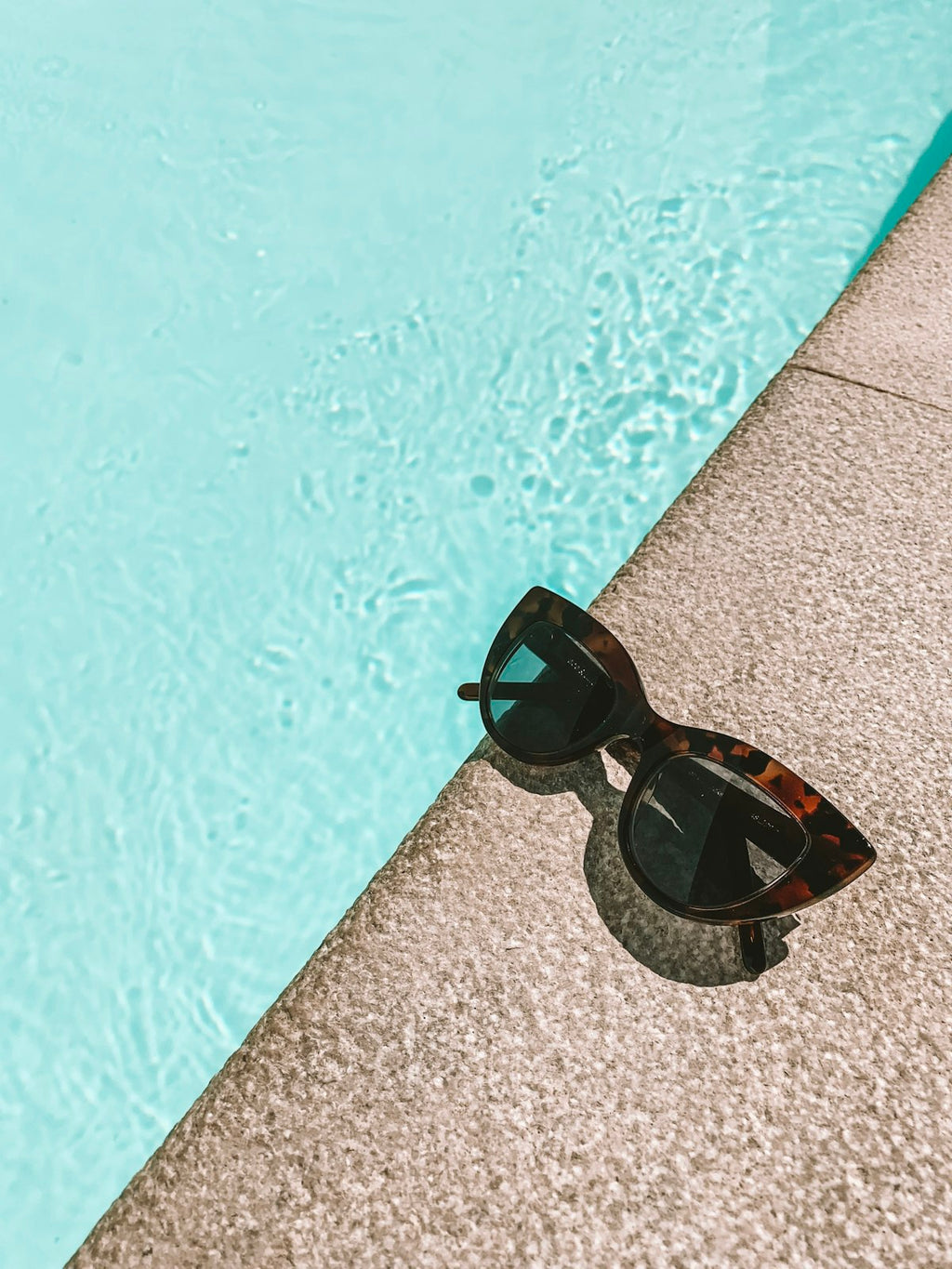 Fashion sunglasses styled on a surface