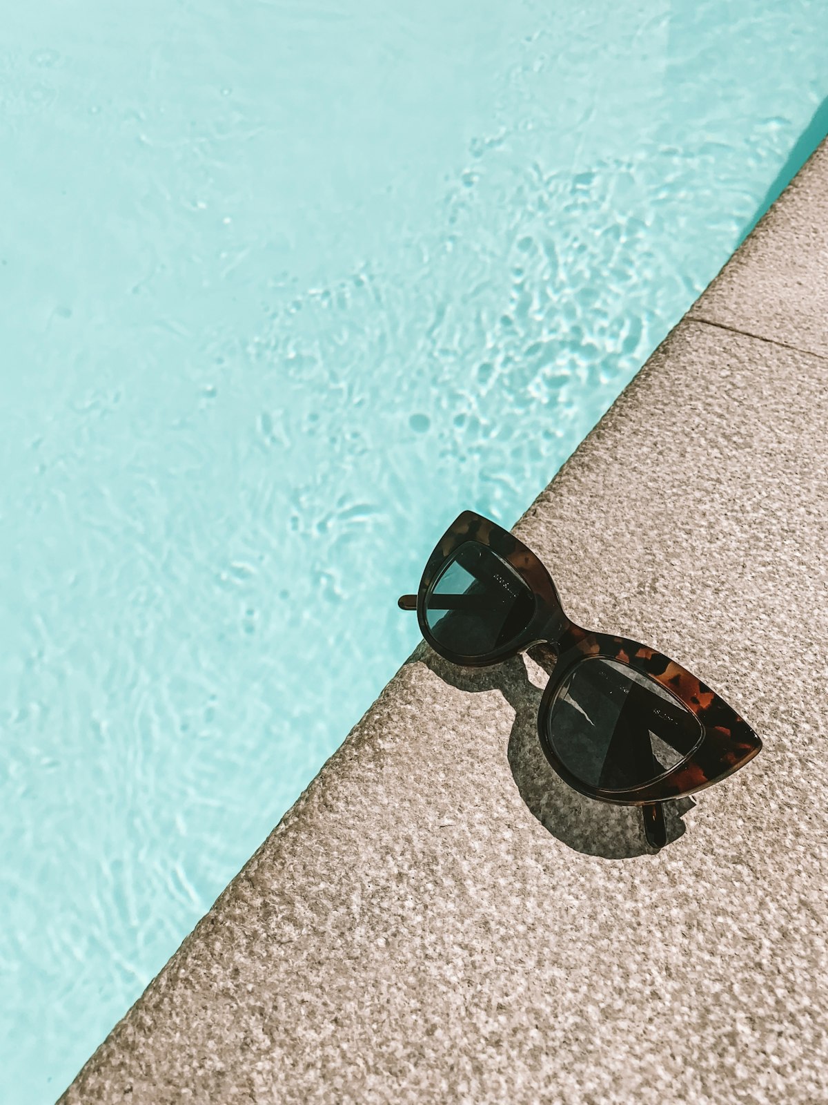 Fashion sunglasses styled on a surface
